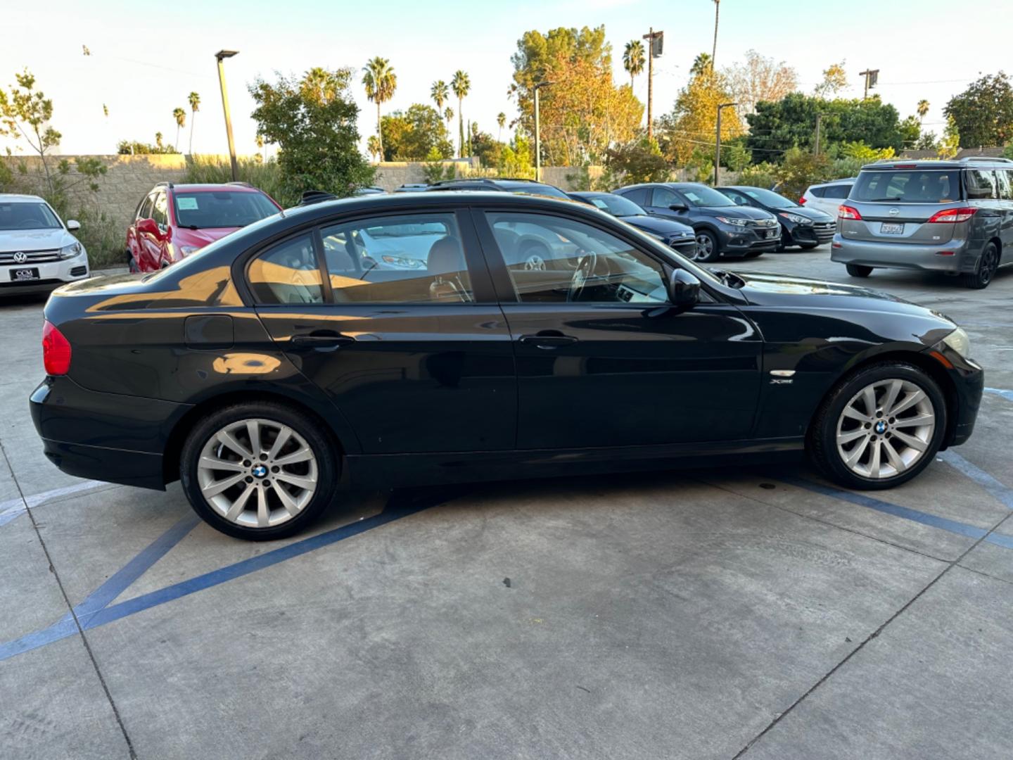 2011 /Tan BMW 3-Series 328i xDrive (WBAPK7C58BF) with an 3.0L L6 DOHC 24V engine, Automatic transmission, located at 30 S. Berkeley Avenue, Pasadena, CA, 91107, (626) 248-7567, 34.145447, -118.109398 - X Drive! South African Edition! Moon-roof! Leather! 2011 BMW 3-Series 328i xDrive - Luxury Meets Practicality in Pasadena, CA Dive into a realm where luxury and performance synchronize seamlessly. The 2011 BMW 3-Series 328i xDrive is not just a car; it's an experience. This model boasts BMW's - Photo#5